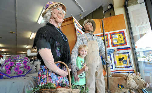 Jake Stanton finds the scarecrows in Caba’s window “not so scary”. Jake Stanton finds the scarecrows in Caba’s window “not so scary”.